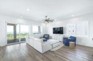 Modern coastal piling home in Navarre by Acorn Fine Homes - Thumb Pic 7