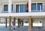 Moreland modern piling home on Navarre Beach by Acorn Fine Homes - Thumb Pic 16