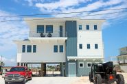 Modern coastal piling home in Navarre by Acorn Fine Homes - Thumb Pic 2