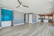 Modern coastal piling home in Navarre by Acorn Fine Homes - Thumb Pic 13