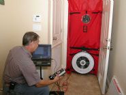 Air leakage testing by Acorn Fine Homes