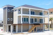 Modern coastal piling home in Navarre by Acorn Fine Homes - Thumb Pic 5