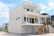 Modern coastal piling home in Navarre by Acorn Fine Homes - Thumb Pic 2