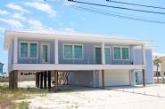 Modern coastal piling home in Navarre by Acorn Fine Homes - Thumb Pic 3