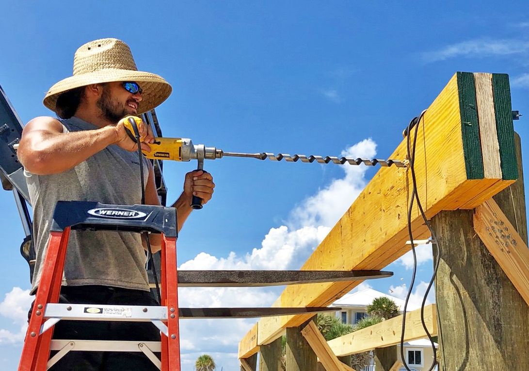 Walker piling home in Navarre Beach by Acorn Fine Homes