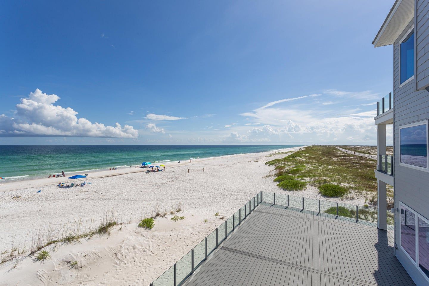 Modern coastal piling home in Navarre by Acorn Fine Homes