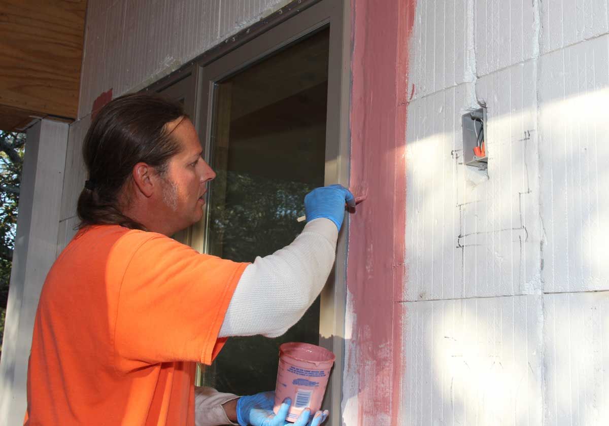 sealing windows on an ICF wall for Acorn Construction