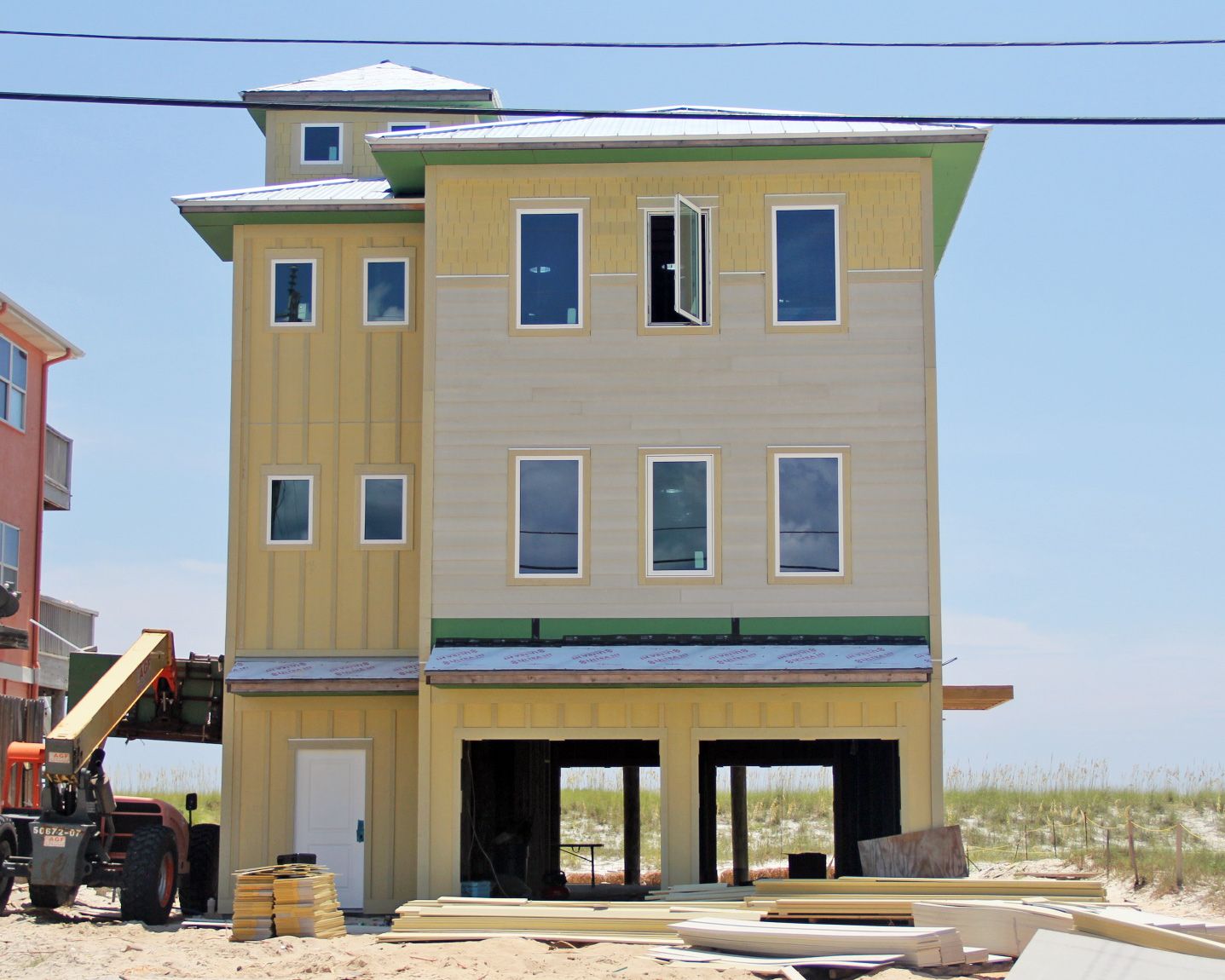 Smith coastal transitional style piling home on Navarre Beach