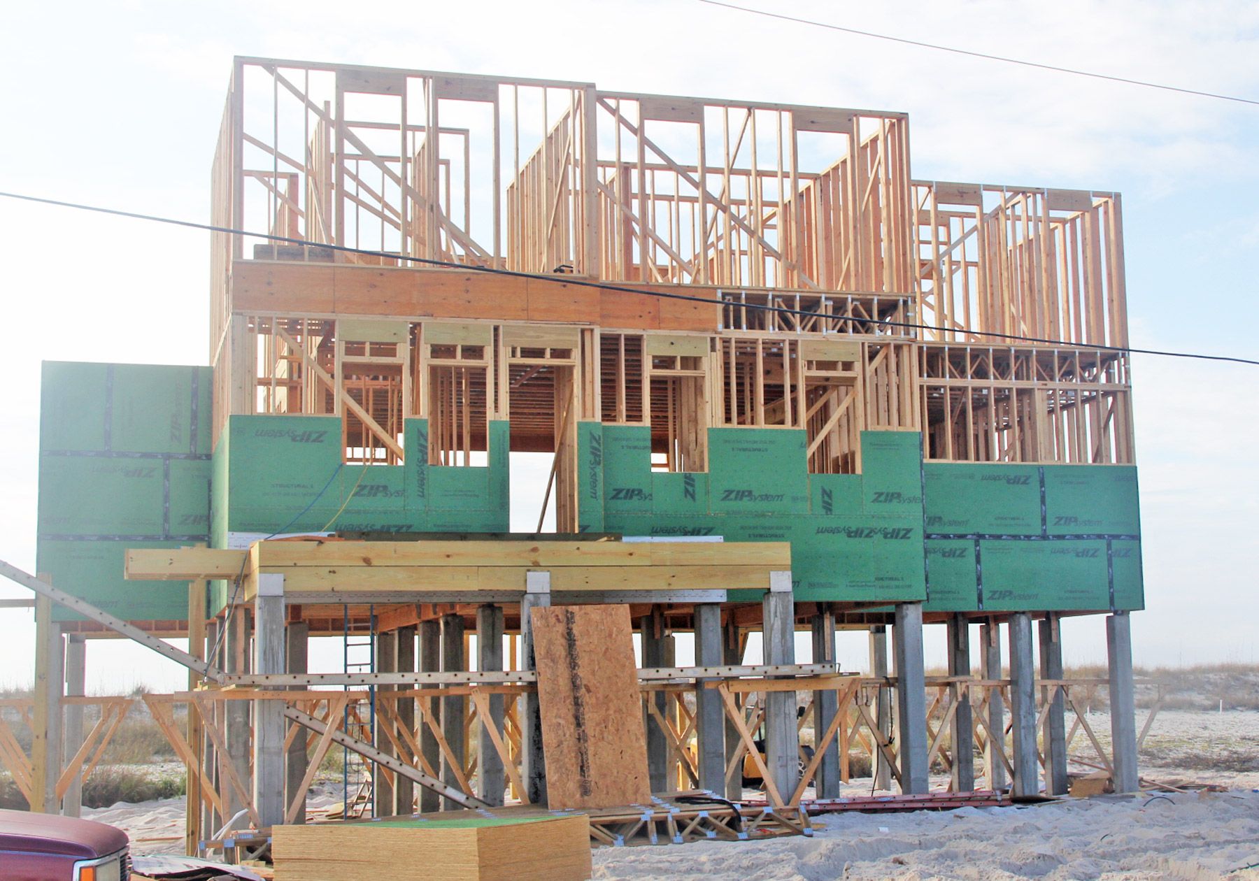 Dubois coastal transitional piling home on Navarre Beach by Acorn Fine Homes 