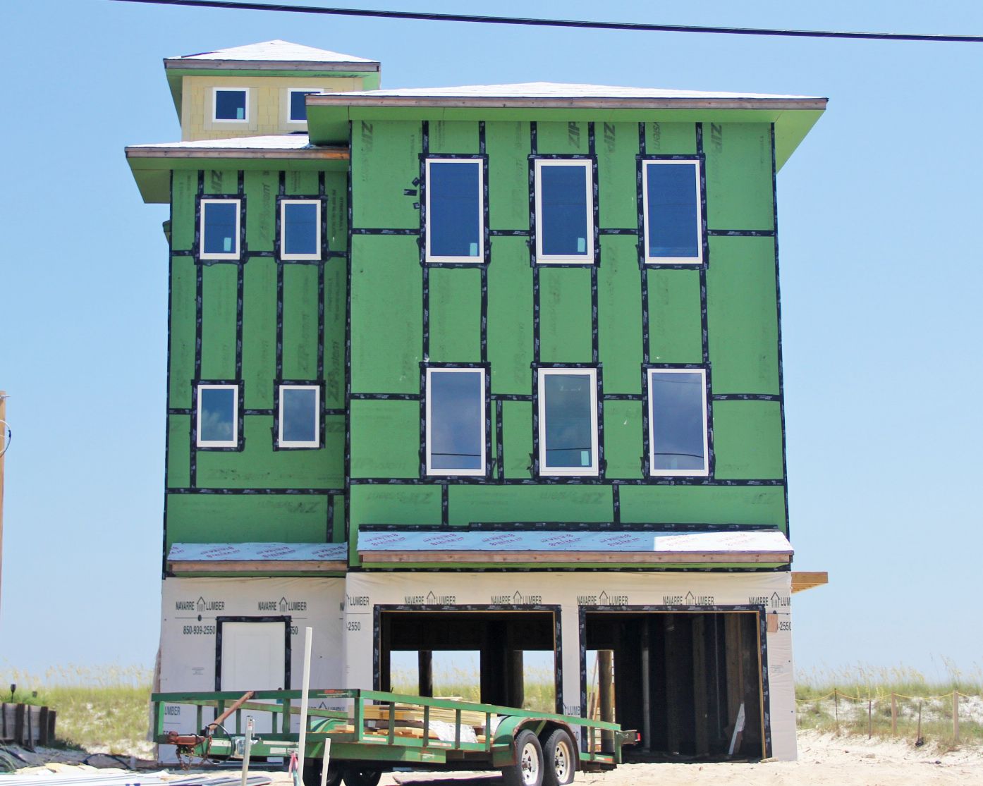 Smith coastal transitional style piling home on Navarre Beach