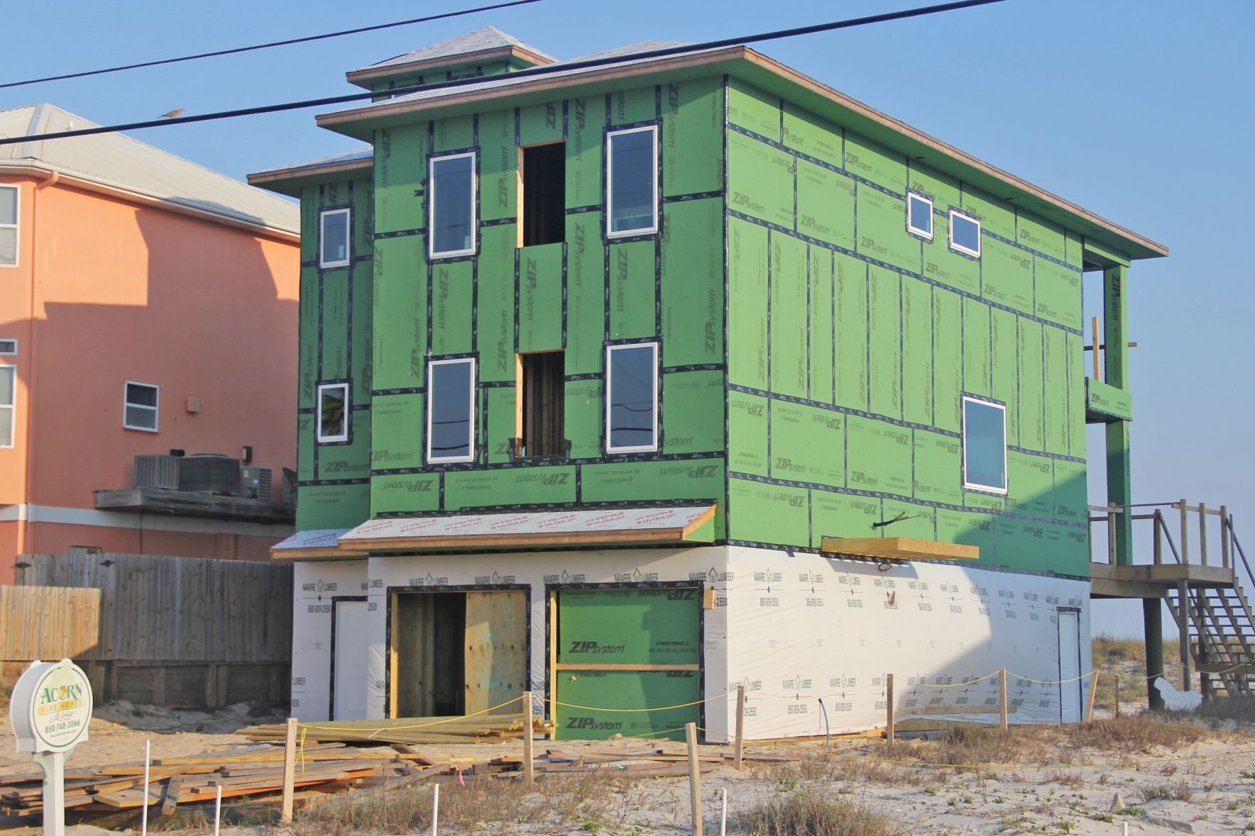 Smith coastal transitional style piling home on Navarre Beach