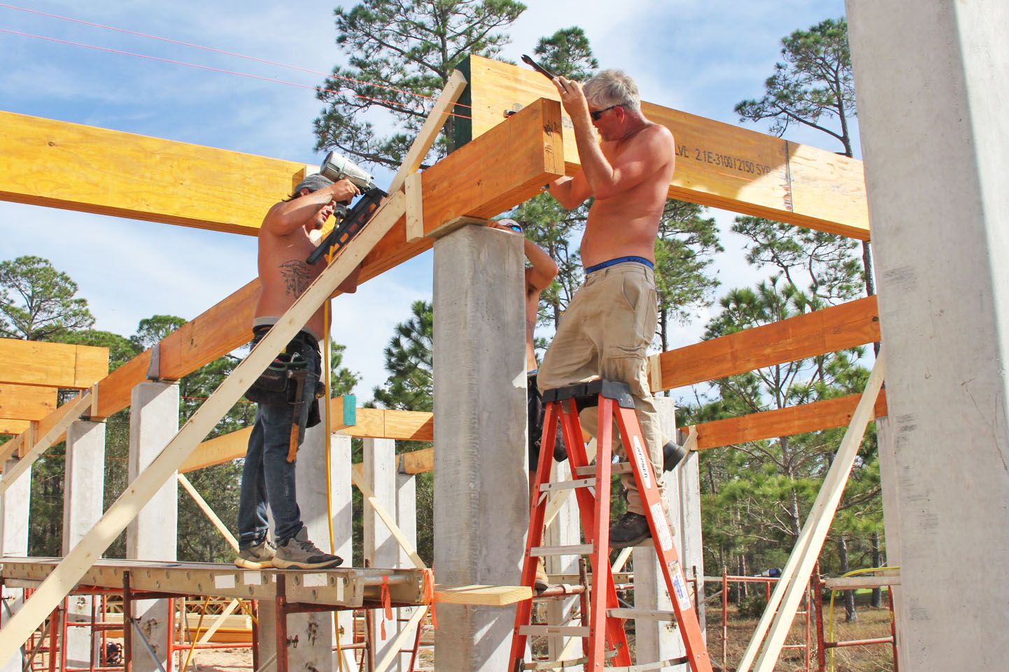 Modern piling home in Navarre by Acorn Fine Homes