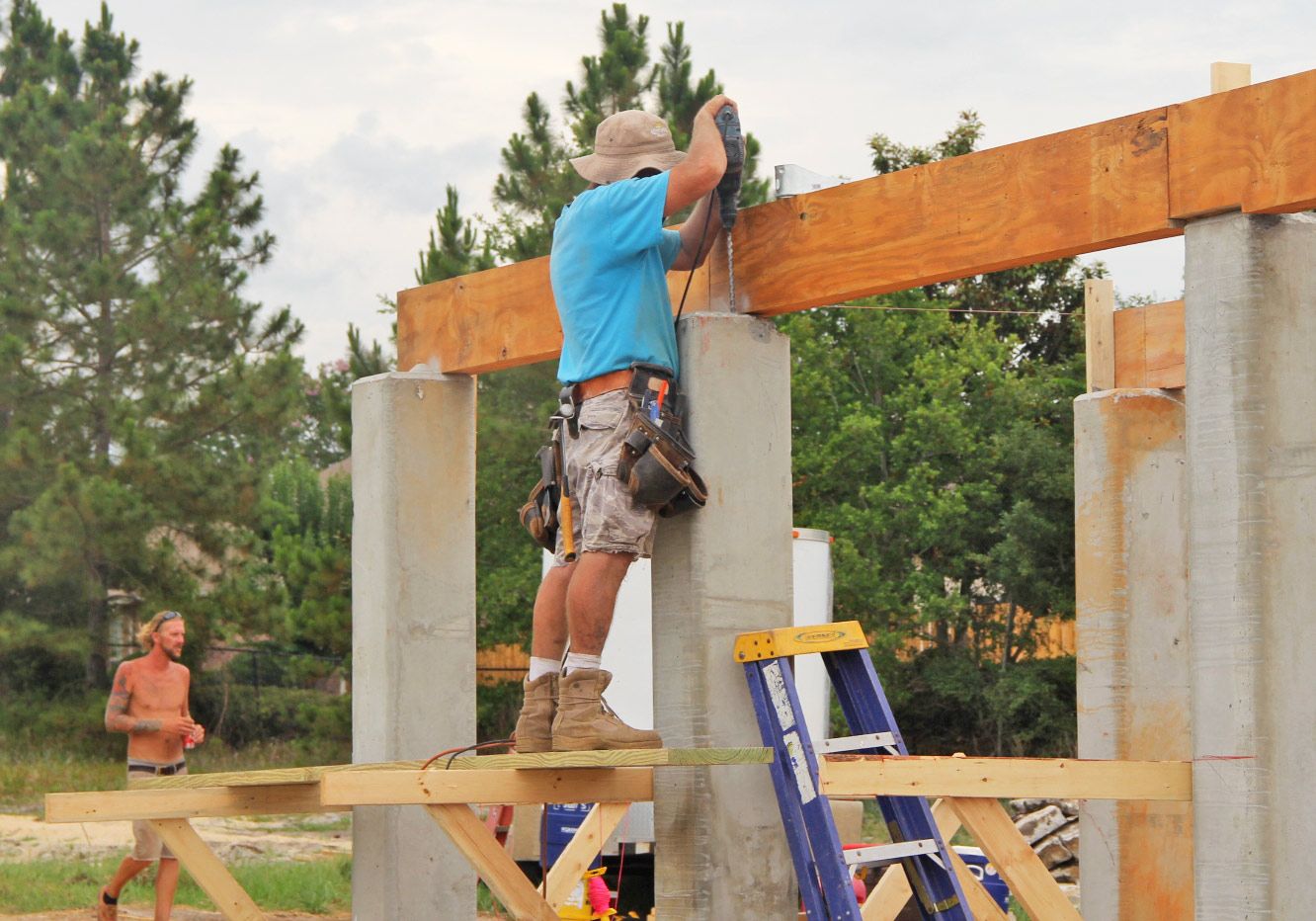 Modern piling home in Navarre by Acorn Fine Homes