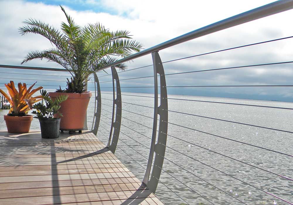 Stainless steel cable railing by Acorn Fine Homes