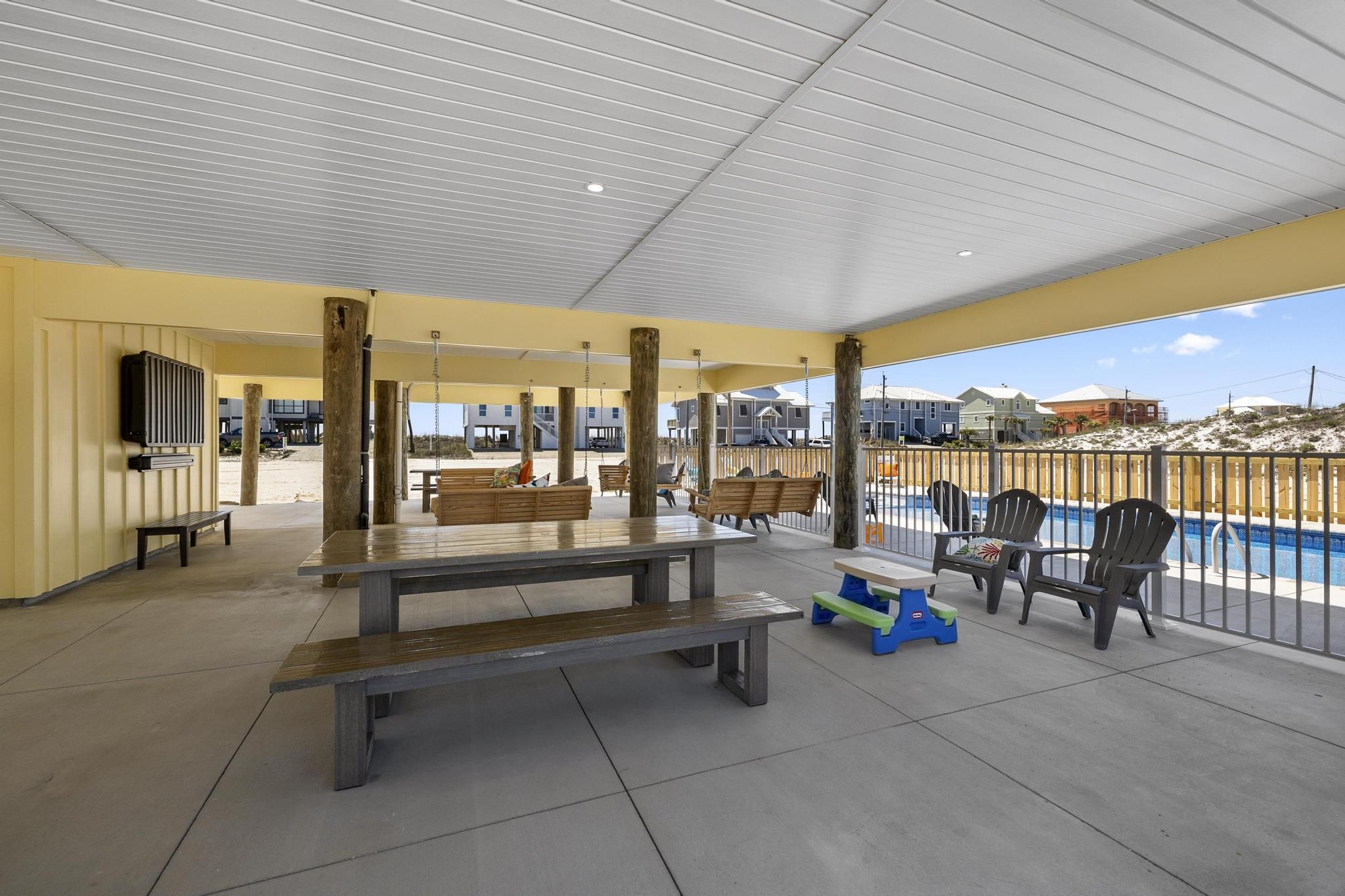 Gomel beach rental piling home on Navarre Beach by Acorn Fine Homes