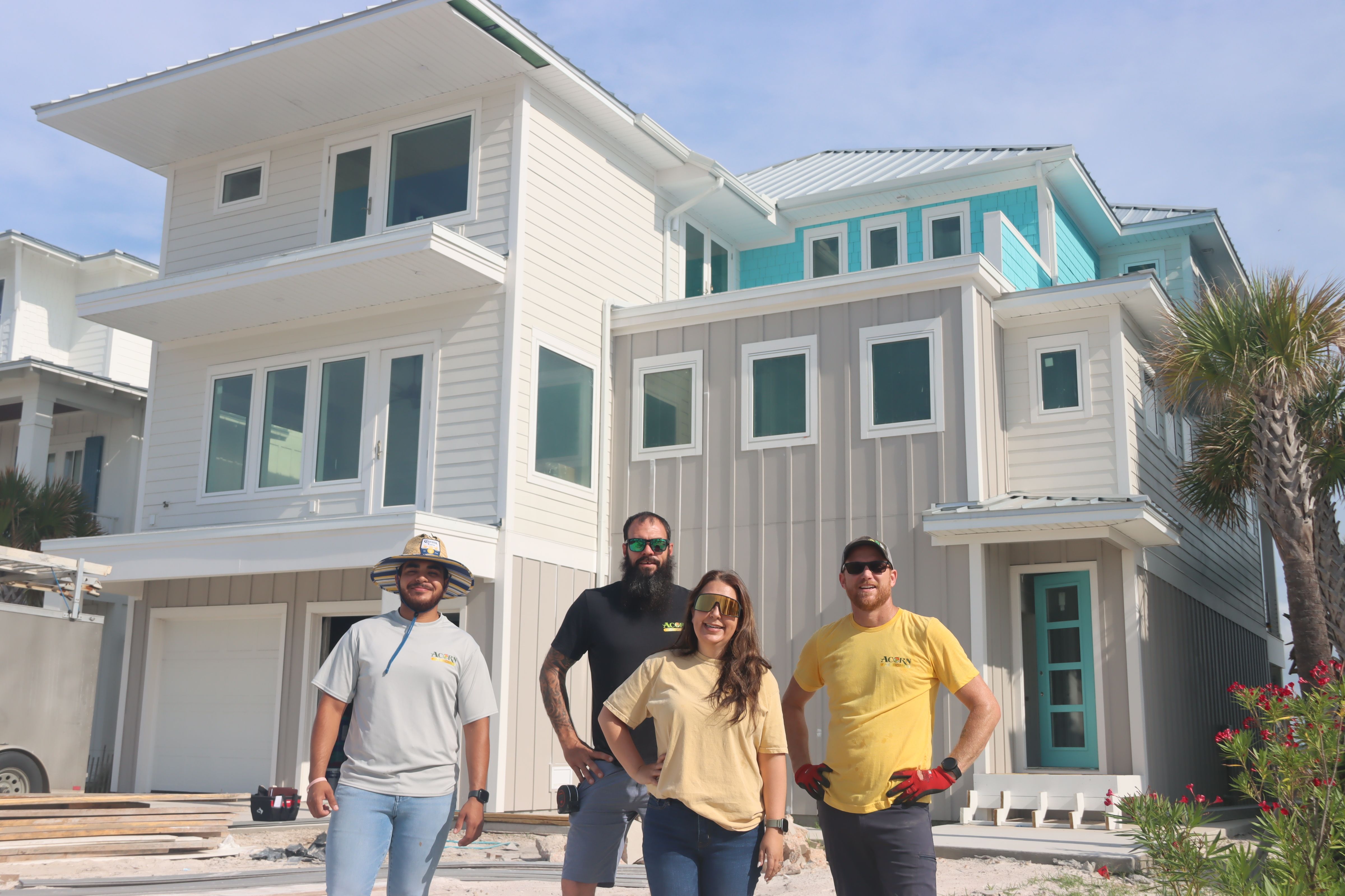 Modern coastal piling home in Navarre by Acorn Fine Homes