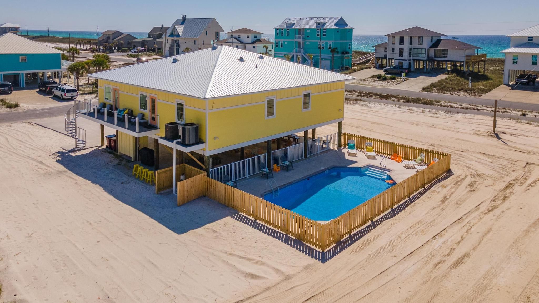 Gomel beach rental piling home on Navarre Beach by Acorn Fine Homes