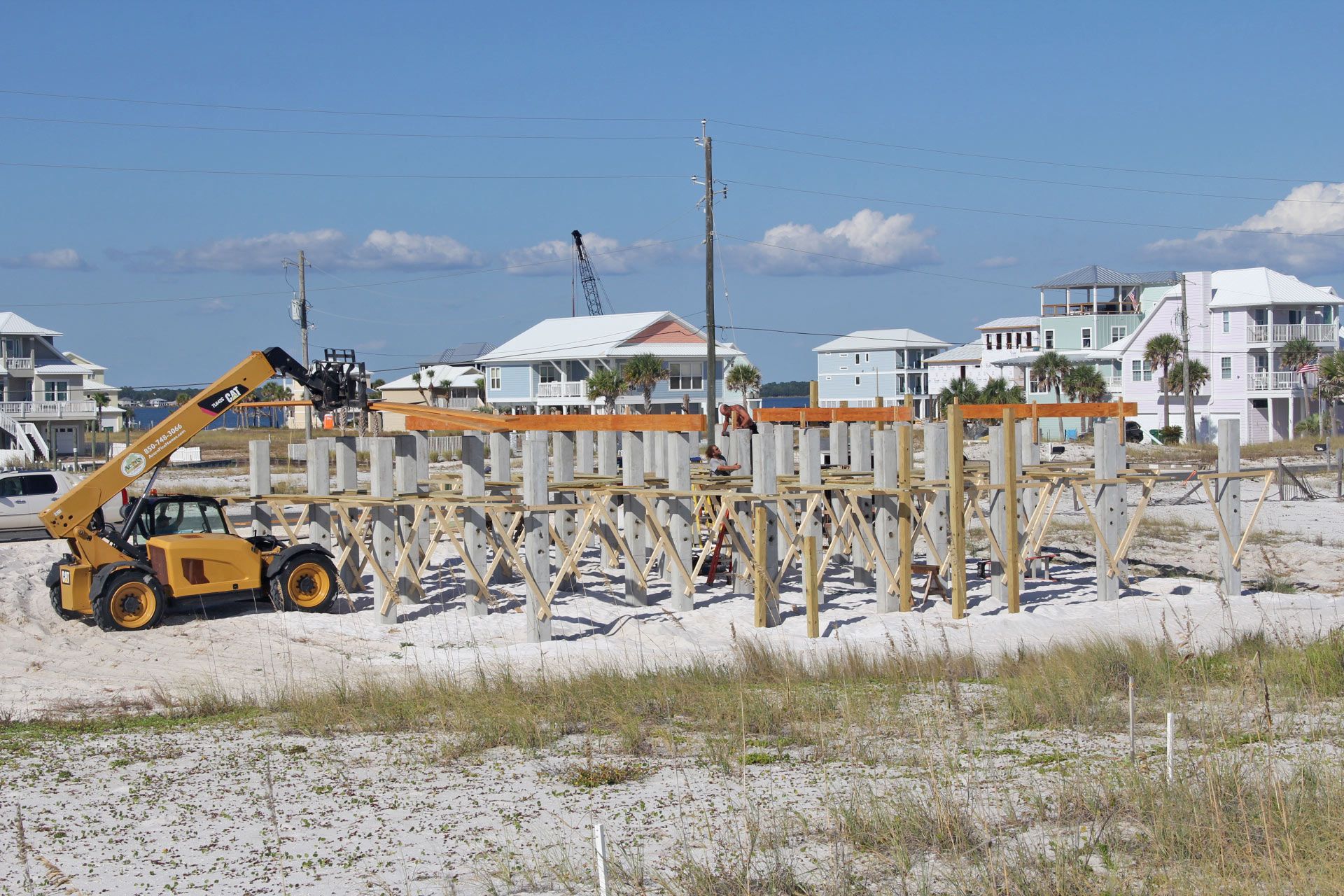 Dubois coastal transitional piling home on Navarre Beach by Acorn Fine Homes 