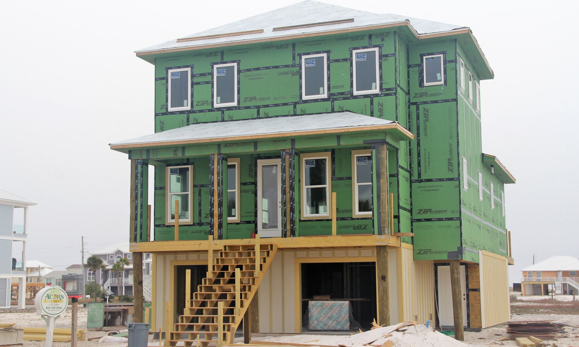 Walker piling home in Navarre Beach by Acorn Fine Homes