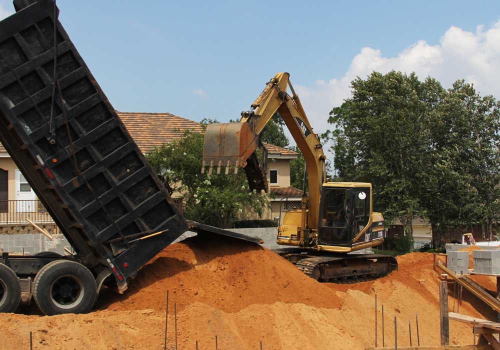 filling the pool for Acorn Fine Homes