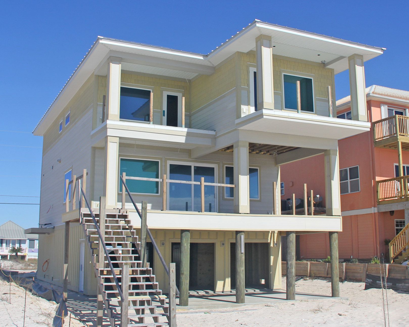 Smith coastal transitional style piling home on Navarre Beach